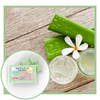 Thumbnail for Aloe vera wax melts with aloe vera leaves and a flower on a wooden surface.