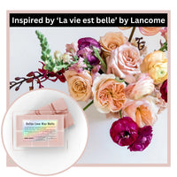 Thumbnail for Bellas Love Wax Melts packaging with a bouquet of flowers inspired by 'La vie est belle' by Lancome.