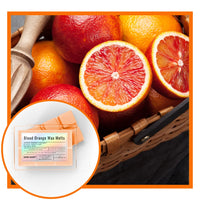 Thumbnail for Basket of blood oranges with a close-up of wax melts labeled 'Blood Orange'.