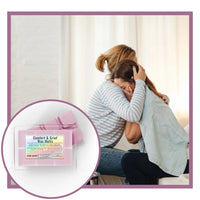 Thumbnail for Two women hugging with a product inset labeled 'Comfort & Grief Wax Melts' on a light background.