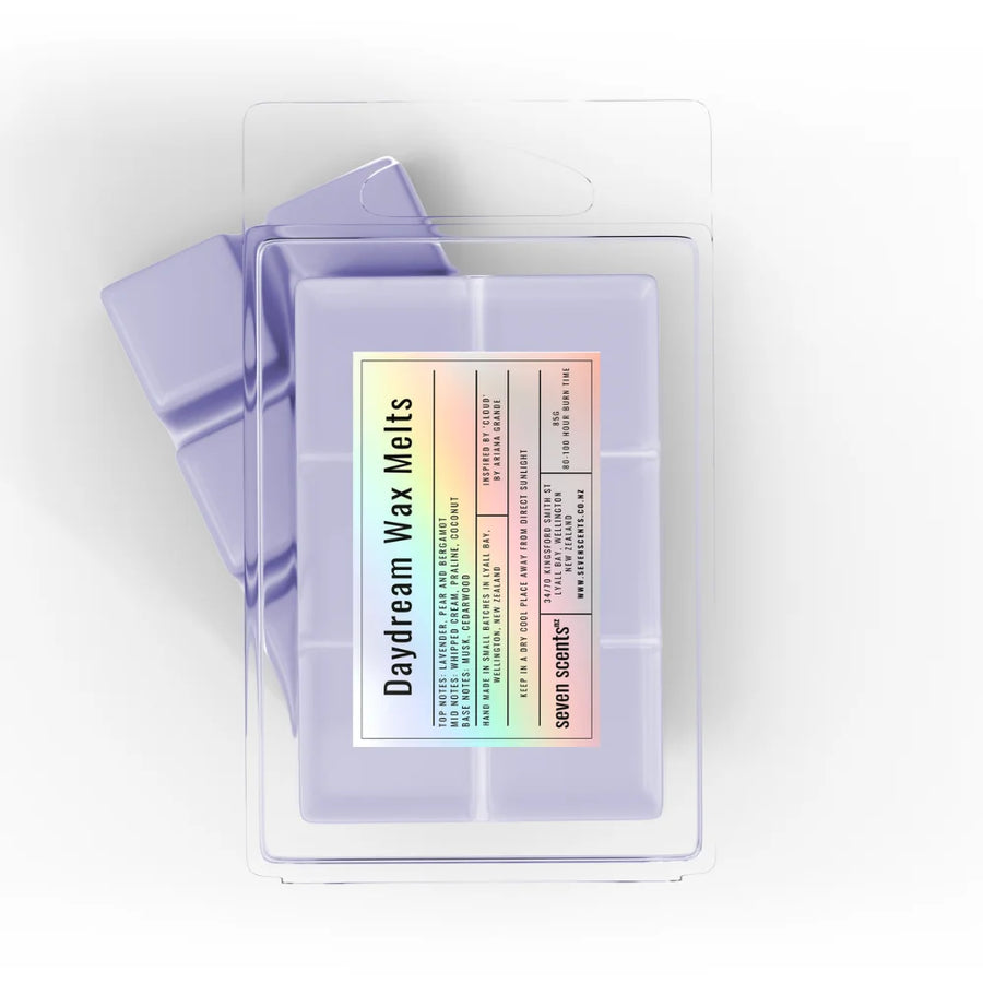 Pack of 'Daydream Wax Melts' by seven scents on a white background