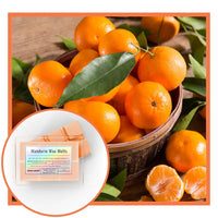 Thumbnail for Basket of mandarin oranges with a close-up of Mandarin Wax Melts packaging.