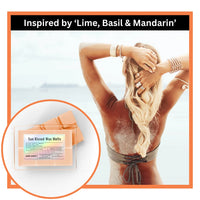 Thumbnail for Woman with sun-kissed skin holding her arms above her head, with a box of Sun Kissed Wax Melts and product packaging inset.