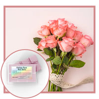 Thumbnail for Bouquet of pink roses with a box of 'Vintage Rose Wax Melts' on a light pink background